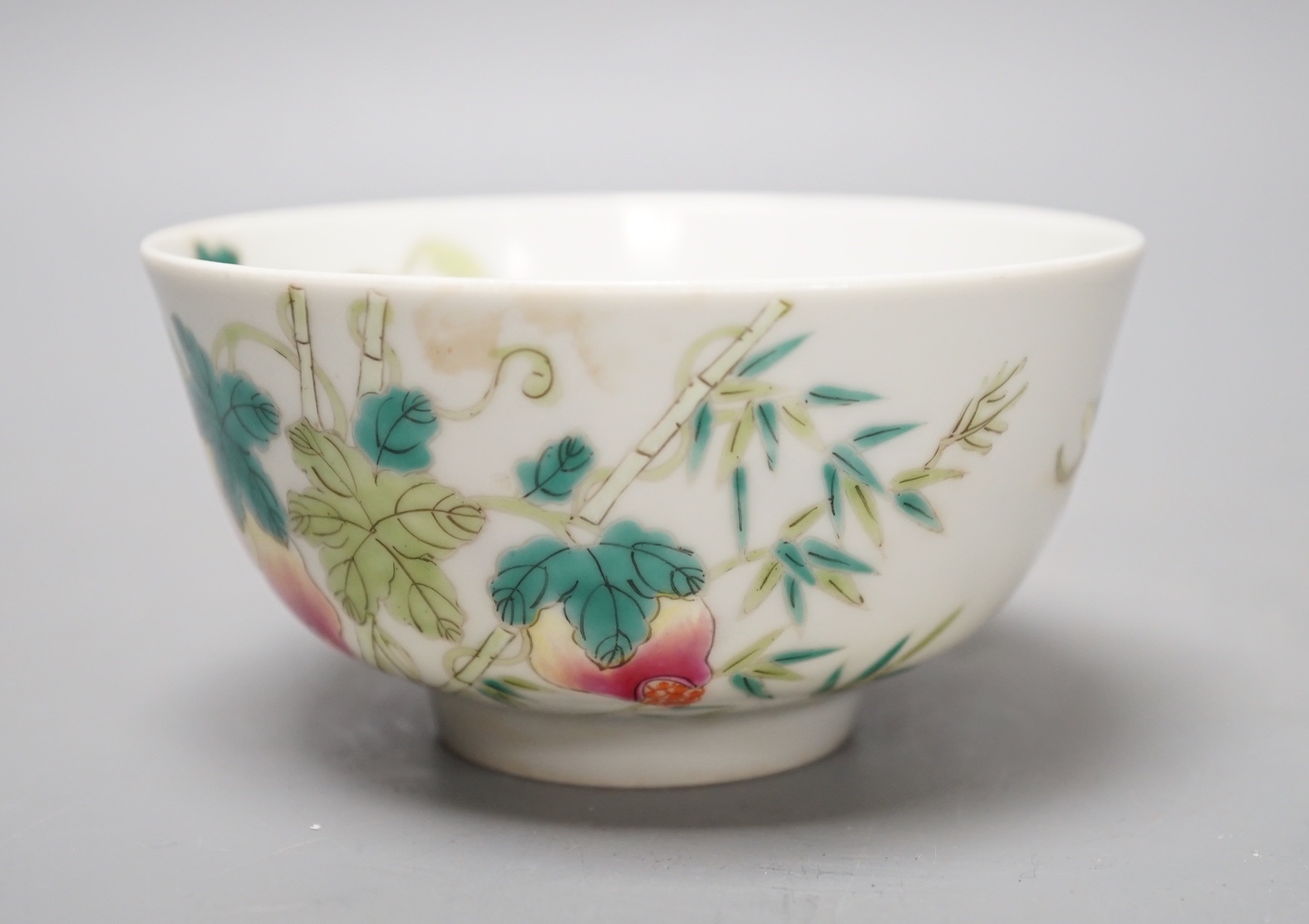 A Chinese famille rose ‘pomegranate’ bowl - 6.5cm high